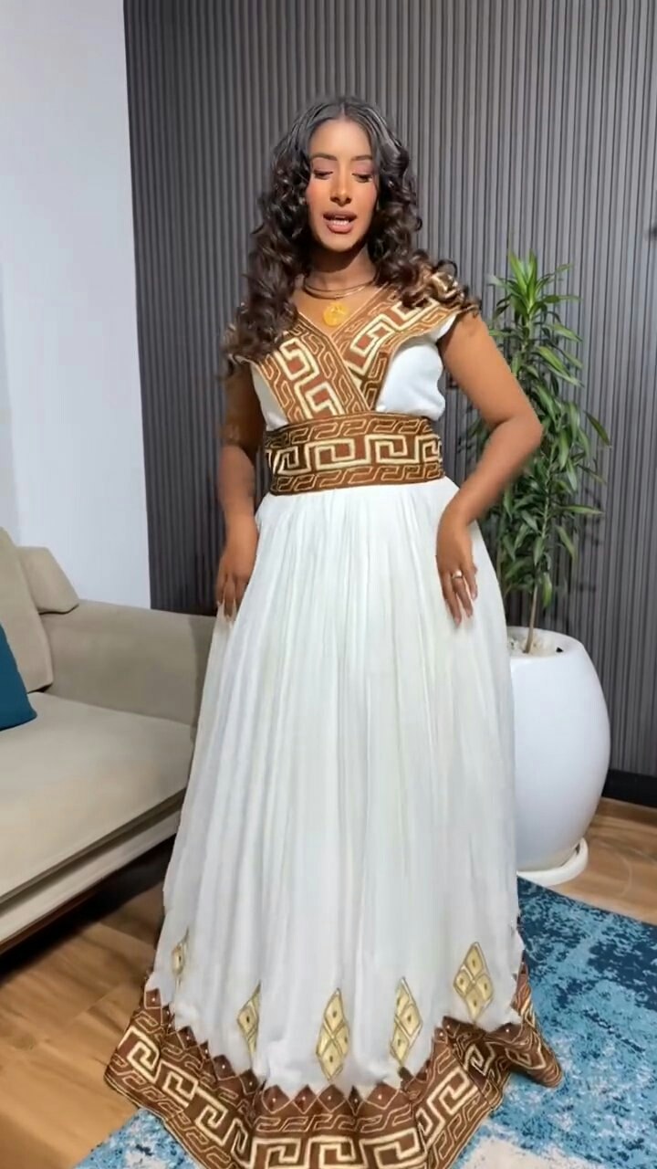 NAHOMET ROYAL, BROWN-PATTERNED HABESHA KEMIS DESIGN | TRADITIONAL ETHIOPIAN WEDDING DRESS | HABESHA DRESS