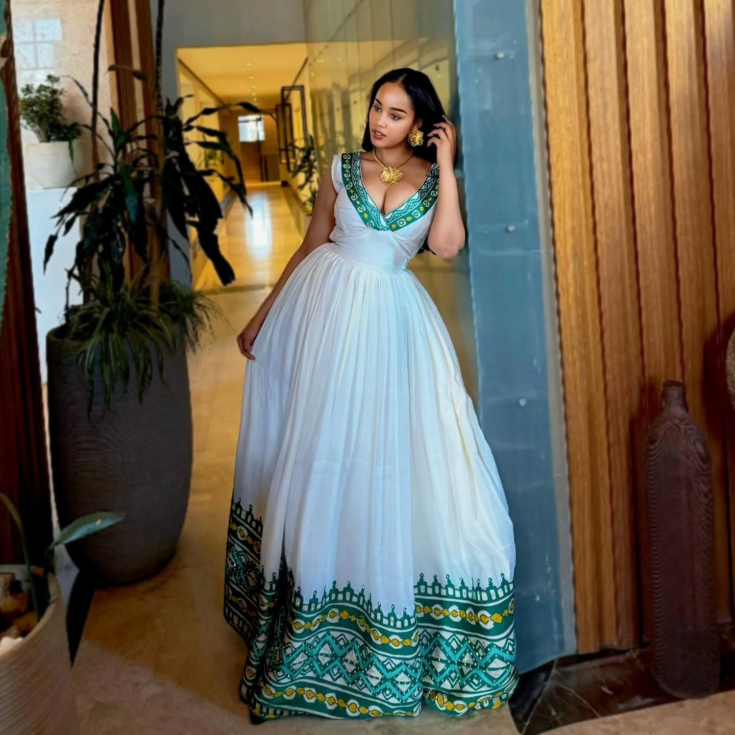ZENBABA SLEEVELESS HABESHA DRESS | V-NECK DETAIL HABESHA KEMIS | HANDWOVEN ETHIOPIAN DRESS ACCENTS FOR CULTURAL ELEGANCE