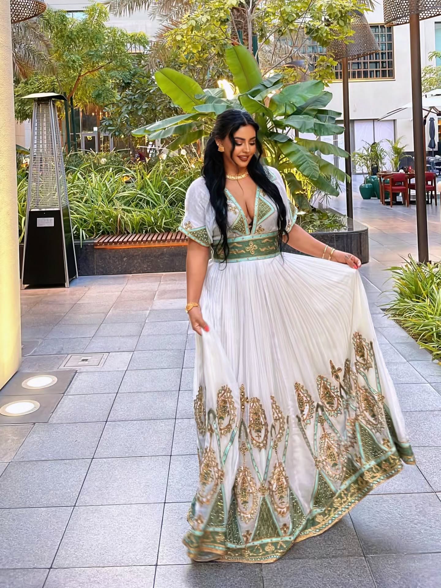 ALEMNESH LUXURIOUS TRADITIONAL ETHIOPIAN CLOTHING | GOLDEN AND GREEN EMBROIDERY HABESHA KEMIS | GRACEFUL HABESHA DRESS