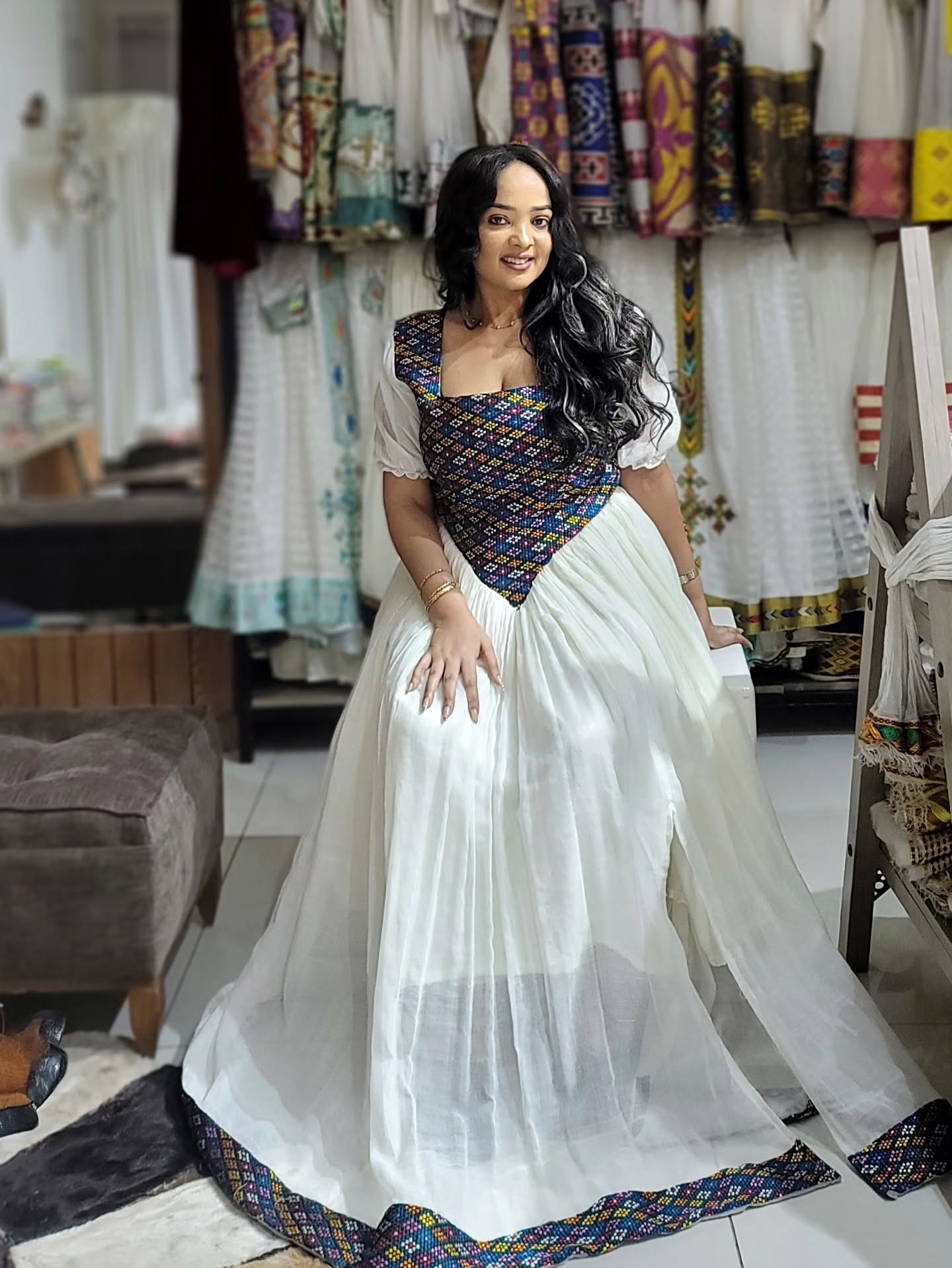 ethiopian modern traditional dress Queen of Sheba Golden Embroidery Slim Fit Dress perfectly embodies the modern Ethiopian aesthetic, merging tradition with contemporary style. #ethiopianculture #habeshabeauty #ethipianbeauty Photographer :@lambadina_films Makeup :@samrawitgetachew04