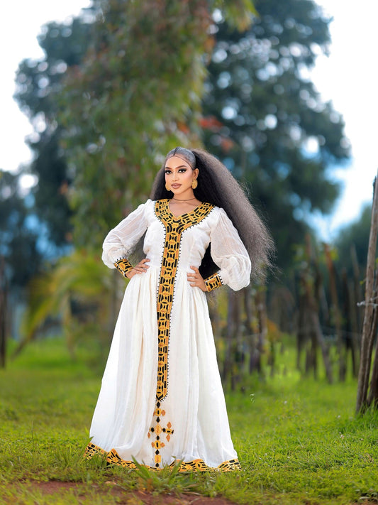 LONG SLEEVE HABESHA KEMIS WITH BLACK AND YELLOW EMBROIDERY