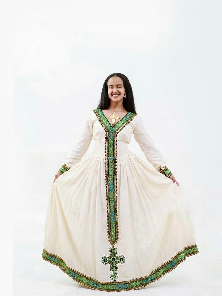 GRACEFUL TRADITIONAL ETHIOPIAN DRESS WITH GREEN EMBROIDERY – HABESHA CLOTH DESIGN