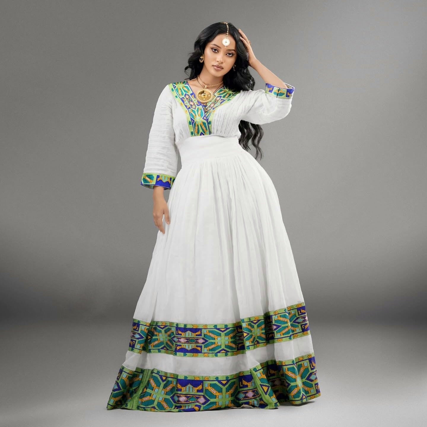 RADIANT HERITAGE HABESHA KEMIS WITH GRACEFUL DETAILS IN A DISTINCT HABESHA DRESS 