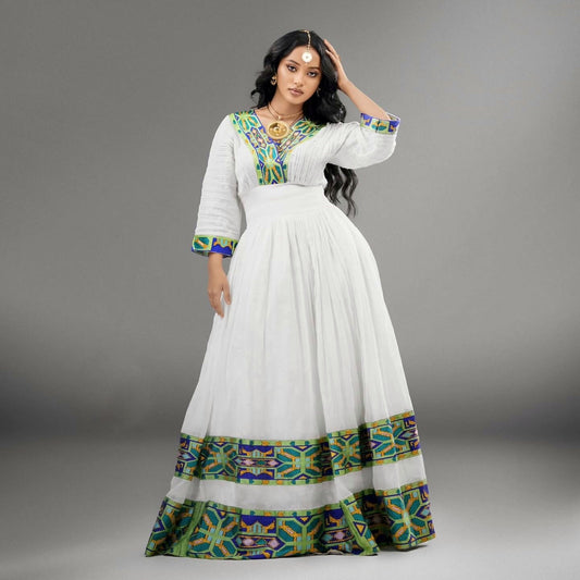 RADIANT HERITAGE HABESHA KEMIS WITH GRACEFUL DETAILS IN A DISTINCT HABESHA DRESS 