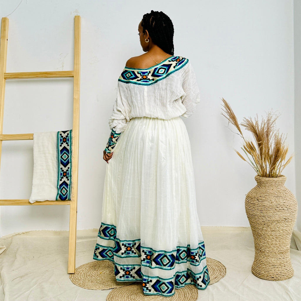 Blue Habesha Kemis with Diamond like Patterns Hab01
