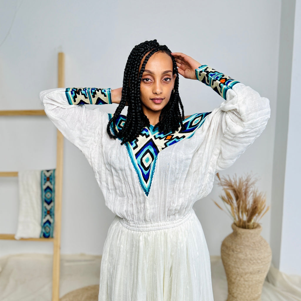 Blue Habesha Kemis with Diamond like Patterns Hab01