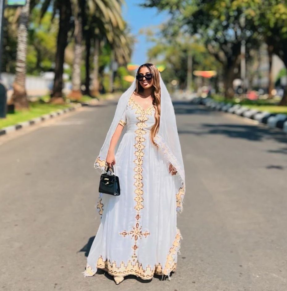 EFRU WHITE HABESHA KEMIS WITH GOLDEN EMBROIDERY | TRADITIONAL ETHIOPIAN DRESS | BEAUTIFUL HABESHA DRESS