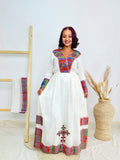 Ethiopian Handwoven White Dress | Vibrant Multicolor Tibeb & Cultural Cross Detail | Bold Habesha Kemis Hab207