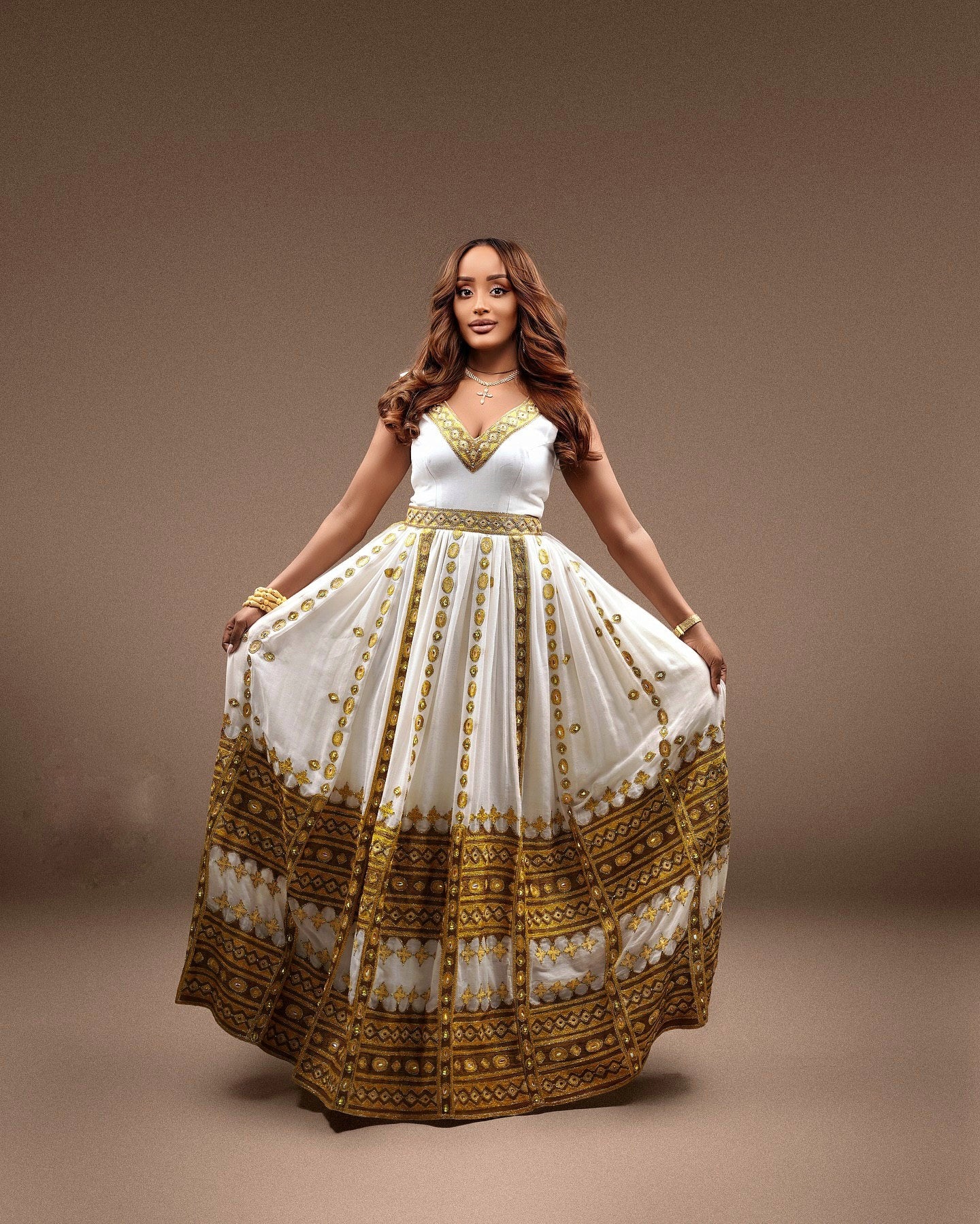 TRADITIONAL ETHIOPIAN WEDDING DRESS – HABESHA KEMIS WITH GOLDEN EMBROIDERY