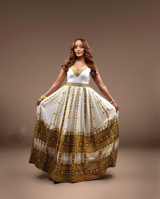 TRADITIONAL ETHIOPIAN WEDDING DRESS – HABESHA KEMIS WITH GOLDEN EMBROIDERY