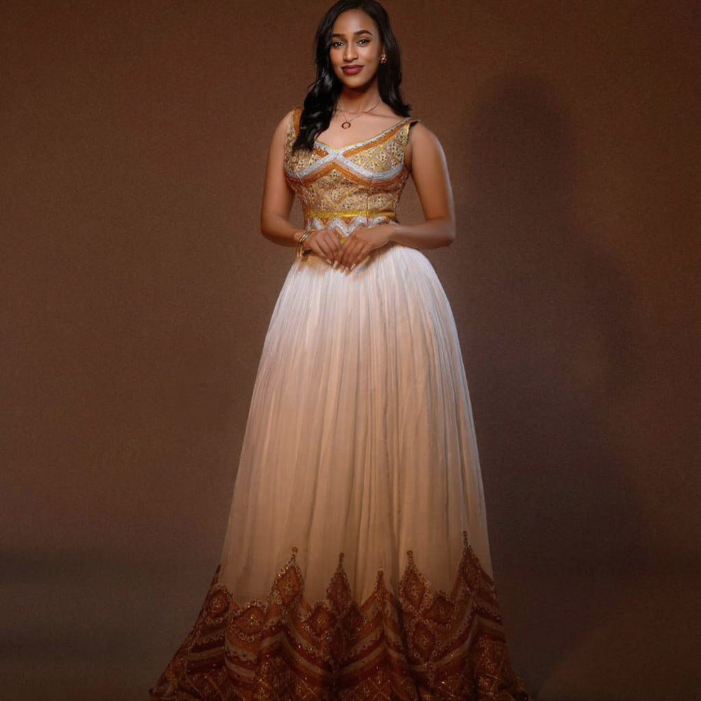 GOLD-EMBROIDERED SLEEVELESS ETHIOPIAN WEDDING DRESS