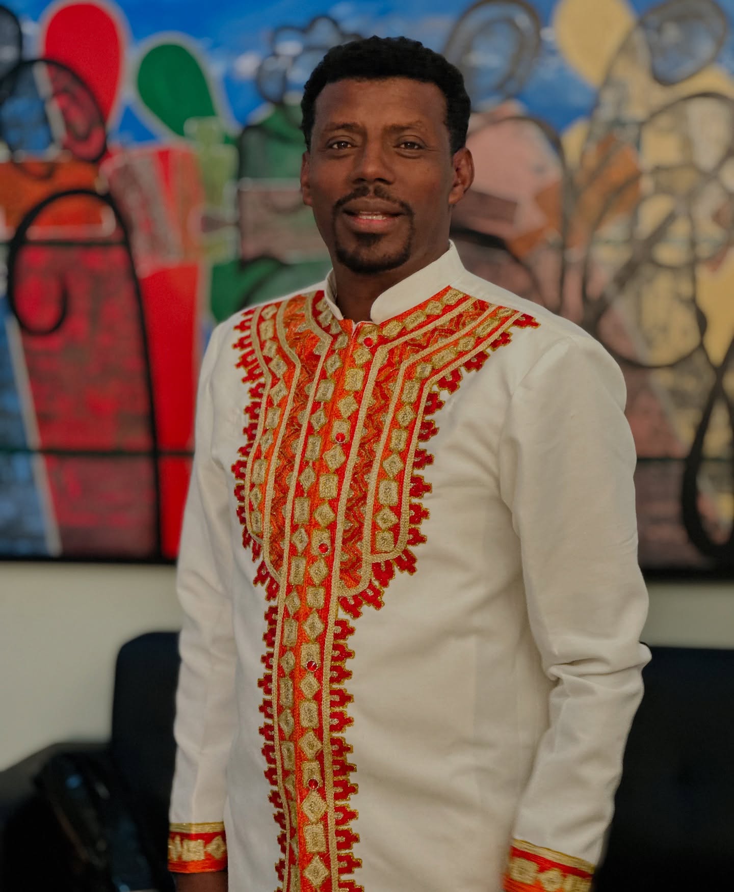 MEN’S ETHIOPIAN TRADITIONAL SHIRT – WHITE WITH GOLD AND RED EMBROIDERY