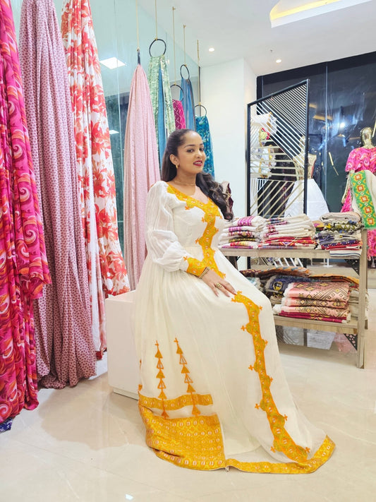 HABESHA KEMIS – YELLOW ETHIOPIAN TRADITIONAL DRESS WITH GOLDEN EMBROIDERY | HABESHA DRESS