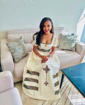BRIGHT WHITE ETHIOPIAN GOWN WITH MULTICOLOR EMBROIDERED DETAILING