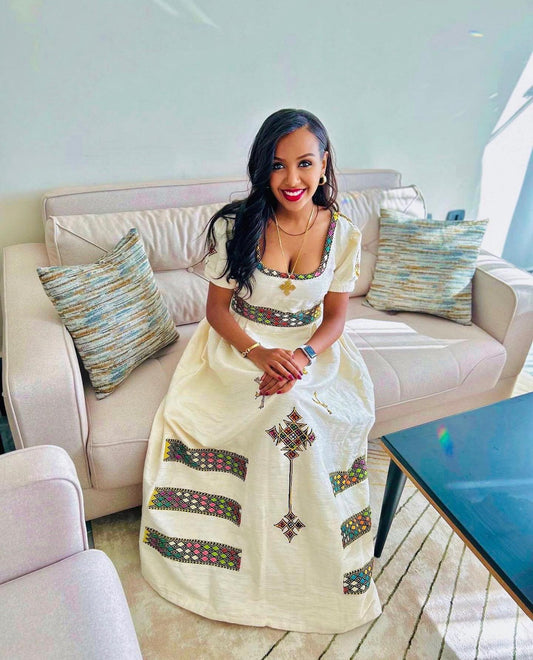 BRIGHT WHITE ETHIOPIAN GOWN WITH MULTICOLOR EMBROIDERED DETAILING