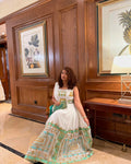 ARTISAN EMBROIDERY AND HERITAGE DESIGN IN A REFINED CEREMONIAL GOWN