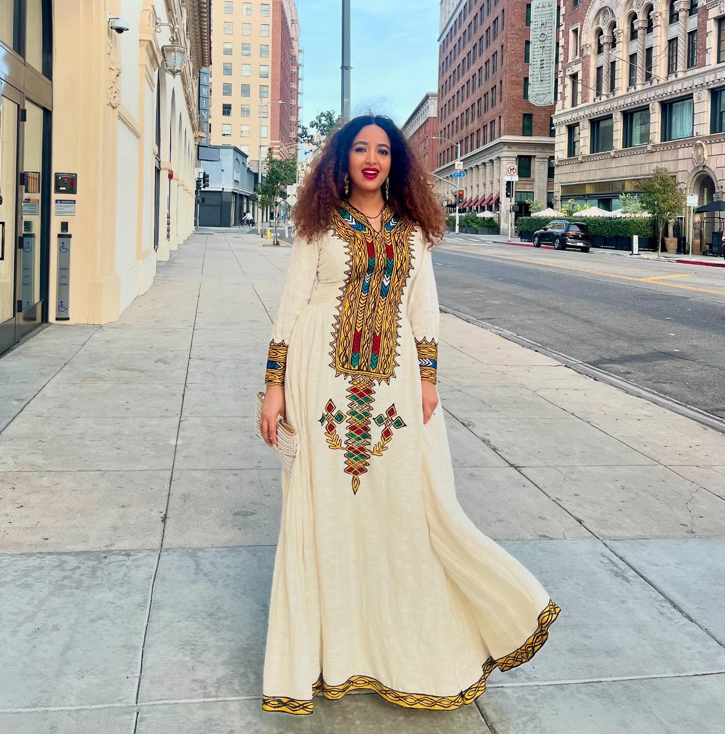 MULTICOLOR LONG SLEEVE HABESHA KEMIS DESIGNED AS A CLASSIC HABESHA DRESS ROOTED IN ETHIOPIAN CLOTHING TRADITION