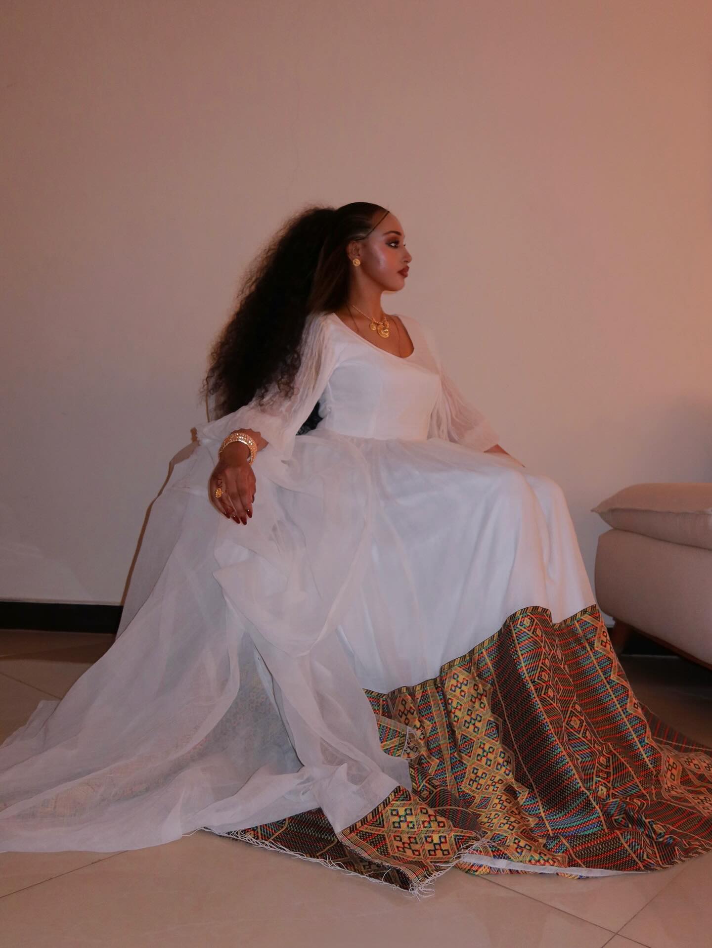 LONG-SLEEVE HABESHA KEMIS WITH WOVEN DETAIL ROOTED IN TRADITIONAL ETHIOPIAN DRESS