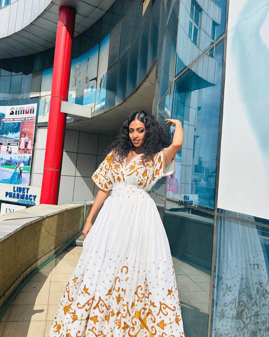WHITE HABESHA KEMIS WITH GOLDEN EMBROIDERY – TRADITIONAL ETHIOPIAN DRESS MADE WITH HABESHA CLOTH