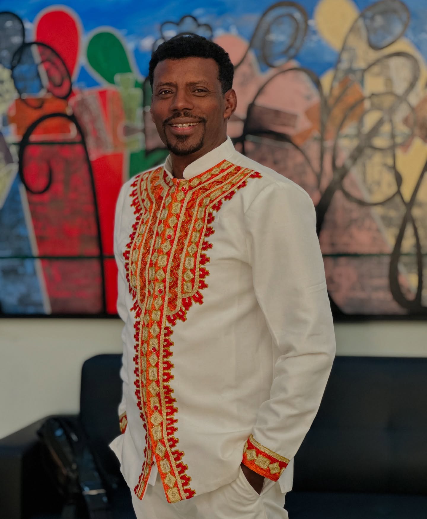 MEN’S ETHIOPIAN TRADITIONAL SHIRT – WHITE WITH GOLD AND RED EMBROIDERY