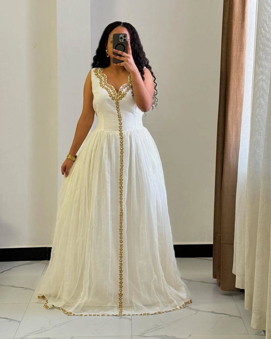 HABESHA KEMIS WITH GOLDEN EMBROIDERY – TRADITIONAL ETHIOPIAN CLOTHING & HABESHA DRESS ELEGANCE