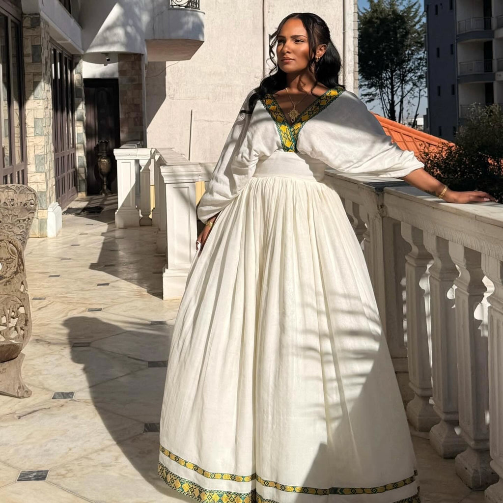 V-NECKLINE HABESHA KEMIS WITH GREEN AND YELLOW EMBROIDERY 