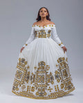 Woman wearing a white off-shoulder dress with gold embroidery on a gray background