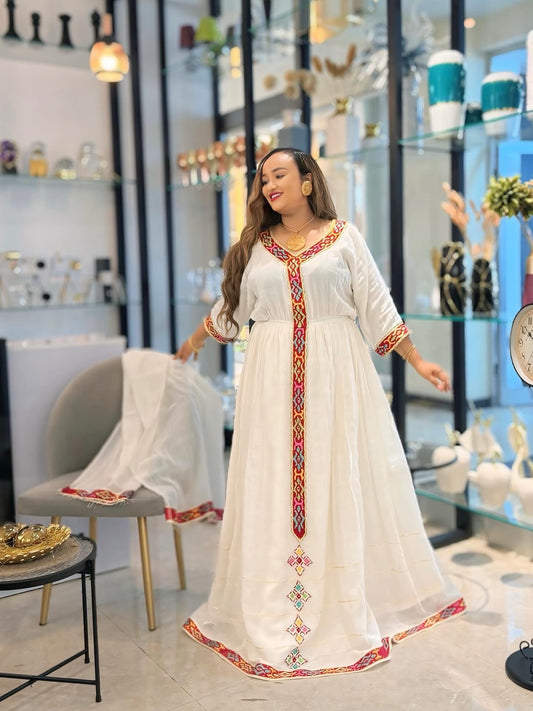 RADIANT HABESHA KEMIS – ELEGANT TRADITIONAL ETHIOPIAN DRESS WITH COLORFUL EMBROIDERY