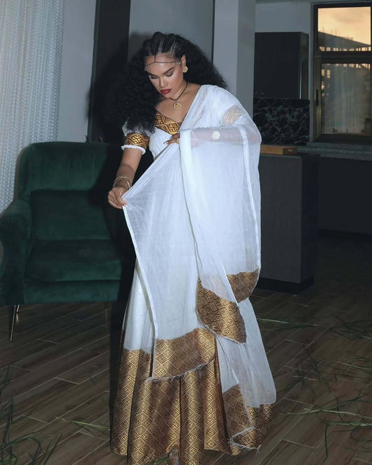HABESHA DRESS – WHITE AND GOLD TRADITIONAL ETHIOPIAN CLOTHING FOR GRACEFUL WOMEN