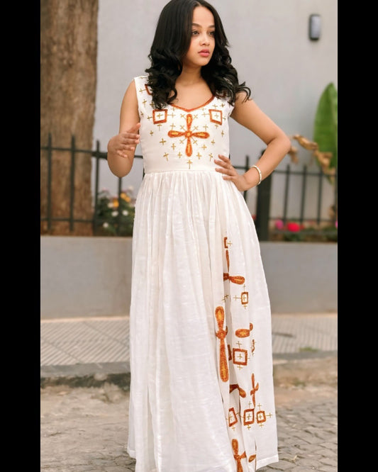 HABESHA DRESS SLEEVELESS DESIGN FEATURING CROSS EMBROIDERY AND ETHIOPIAN CLOTHING ART