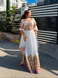 COLORFUL SHORT SLEEVE TRADITIONAL HABESHA STYLE WITH MULTICOLOR EMBROIDERY AND HERITAGE INFLUENCE