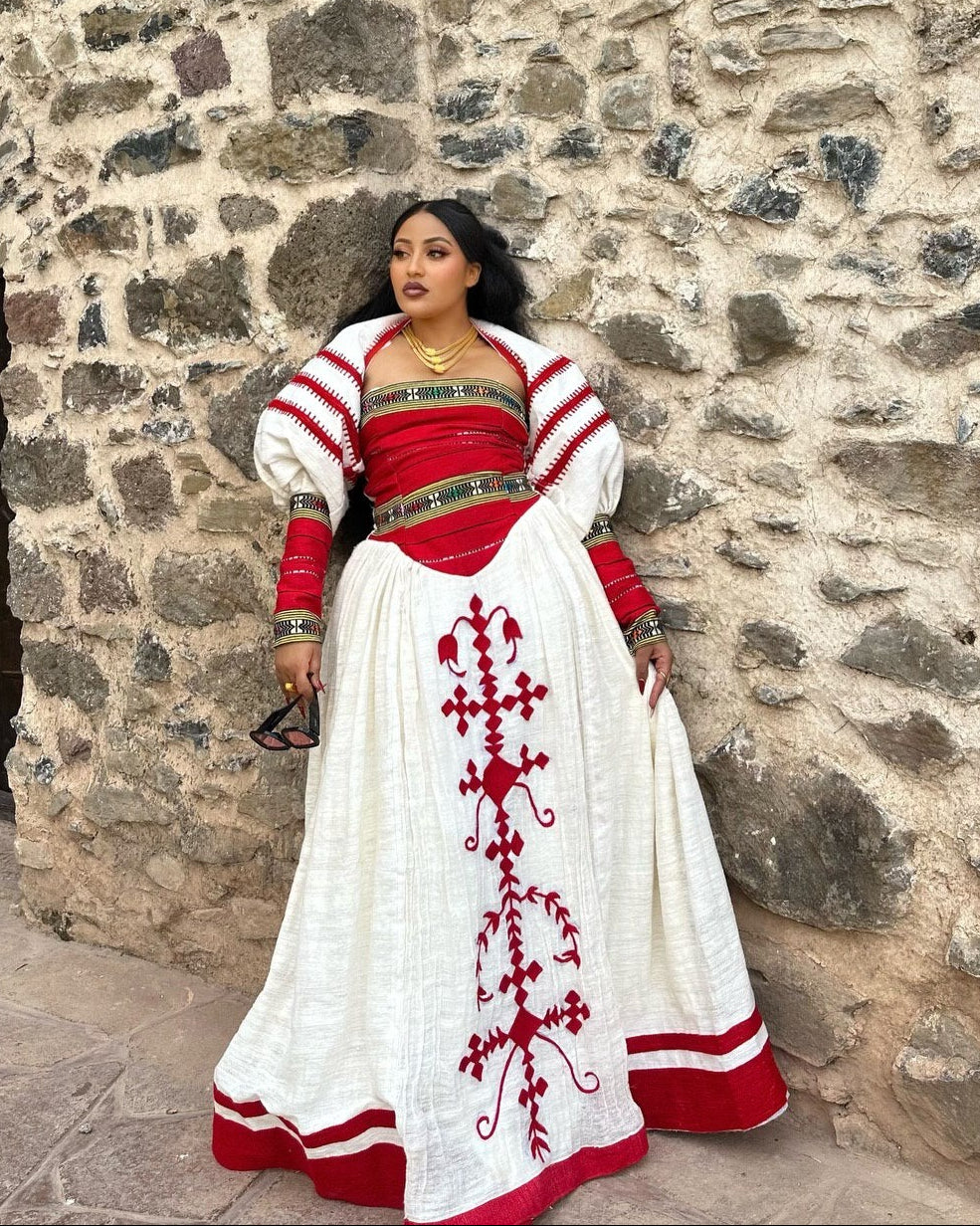 TINEBEB TRADITIONAL WHITE HABESHA KEMIS WITH RED DETAILS | ETHIOPIAN CLOTHING | HABESHA DRESS FOR CULTURAL EVENTS
