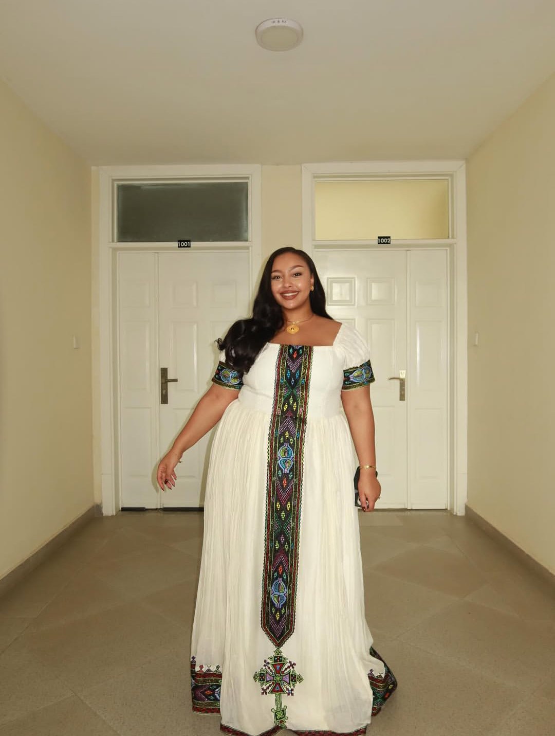 SHORT-SLEEVE HABESHA KEMIS WITH MULTICOLOR EMBROIDERY INSPIRED BY TRADITIONAL ETHIOPIAN DRESS