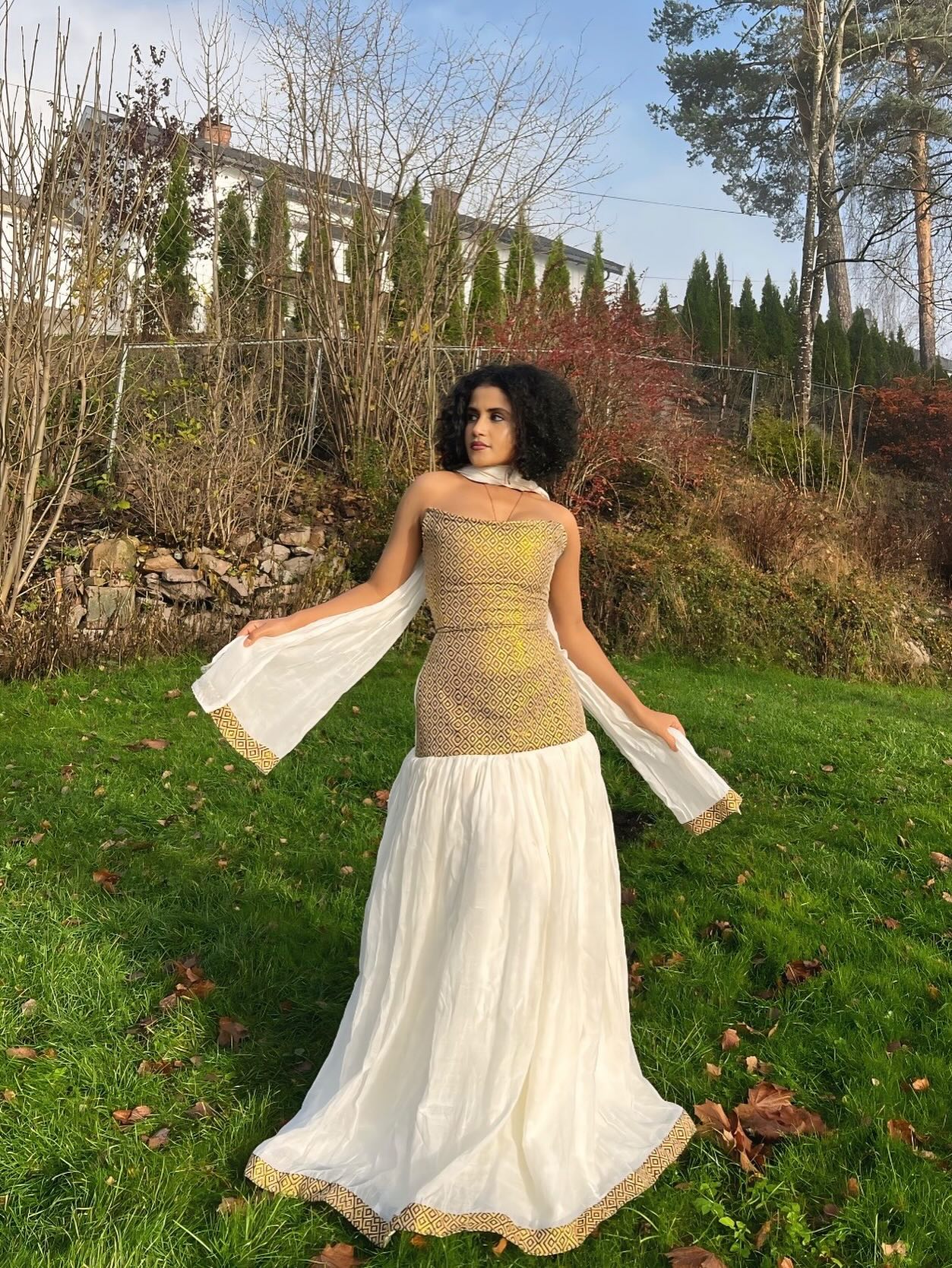 TIMNET REGAL ETHIOPIAN CLOTHING | HANDCRAFTED HABESHA DRESS | VIBRANT HABESHA KEMIS